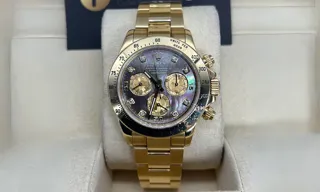 Rolex Daytona 116528-0039 Yellow gold Black