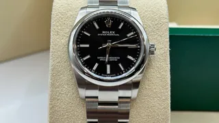 Rolex Oyster Perpetual 124200-0002 Stainless steel Black