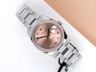 Rolex Oyster Perpetual Date 115234-0009 White gold and Stainless steel Pink