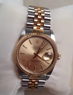 Rolex Oyster Perpetual "Datejust" 16233-003 Yellow gold and Stainless steel Champagne