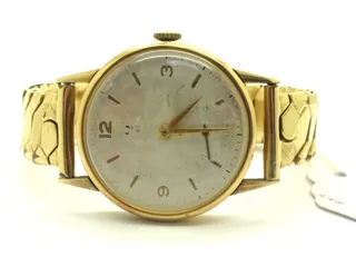 Omega 14k yellow gold