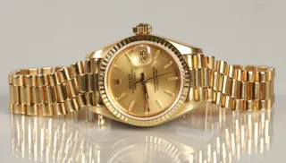 Rolex Oyster Perpetual Date 15007 Yellow gold Champagne