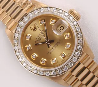 Rolex President 26mm 18k yellow gold Champagne