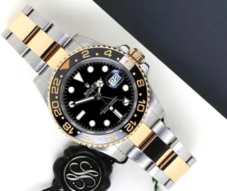 Rolex GMT-Master II 116713LN-0001 Yellow gold and Stainless steel Black