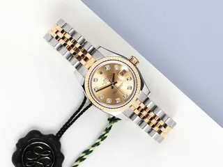 Rolex Lady-Datejust 179173 Yellow gold and Stainless steel Champagne