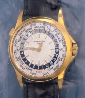 Patek Philippe World Time 5110J-010 37mm 18k yellow gold