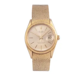 Rolex Oyster Perpetual Date 1501 18k yellow gold Champagne