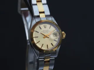 Rolex Oyster Perpetual Lady Date Stainless steel and 18k yellow gold Champagne