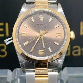 Rolex Oyster Perpetual 14203 Yellow gold and Stainless steel Golden