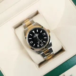 Rolex Explorer 124273-0001 Yellow gold and Oystersteel Black