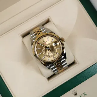 Rolex Sky-Dweller 336933-0002 Yellow gold and Stainless steel Champagne