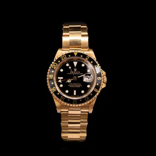 Rolex GMT-Master II 16718 Yellow gold Black