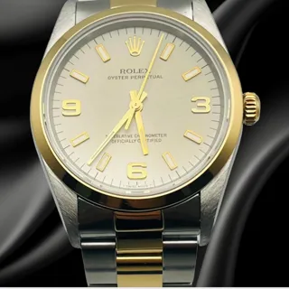 Rolex Oyster Perpetual 34 14203 Yellow gold and Stainless steel Champagne