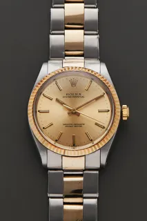 Rolex Oyster Perpetual Stainless steel and 18k yellow gold Champagne