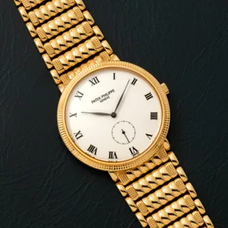 Patek Philippe Calatrava 3919-020J Yellow gold White