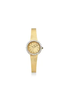 Universal Genève 4978 14k yellow gold Champagne