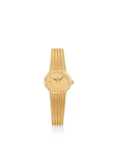 Universal Genève 18k yellow gold Champagne