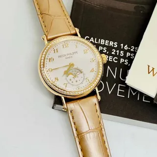 Patek Philippe Moonphase 7121J-001 33mm Yellow gold White