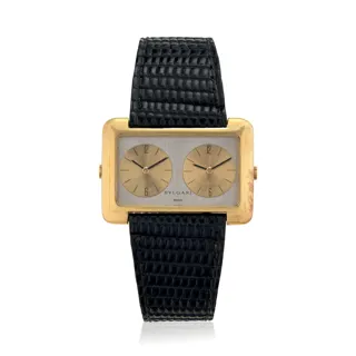 Gérald Genta Dual Time 18k yellow gold Silver and Champagne