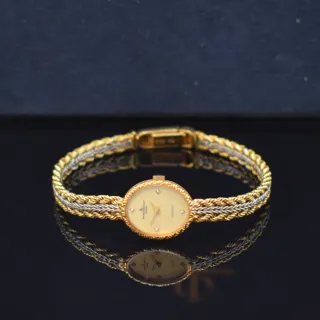 Baume & Mercier 15mm 18k white gold and 18k yellow gold