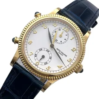 Patek Philippe Travel Time 4864J-001 30mm Yellow gold White