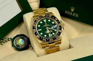 Rolex GMT-Master II 116718LN 40mm Yellow gold Green