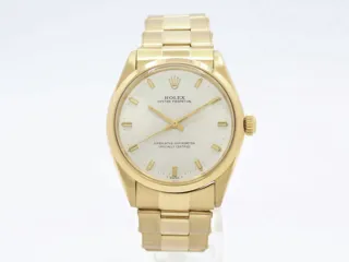 Rolex Oyster Perpetual 1002 18k yellow gold Champagne