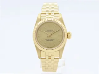 Rolex Oyster Perpetual 67198 18k yellow gold Champagne