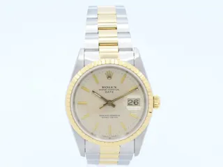 Rolex Oyster Perpetual Date 15223 Stainless steel and 18k yellow gold Champagne