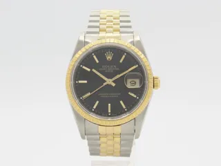 Rolex Oyster Perpetual Date 15223 Stainless steel and 18k yellow gold Black