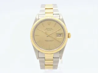 Rolex Oyster Perpetual Date 15223 Stainless steel and 18k yellow gold Champagne