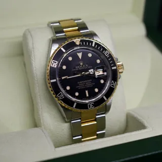 Rolex Submariner 16803 40mm Yellow gold and Stainless steel Black