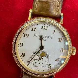 Patek Philippe Moonphase 7121J-001 33mm Yellow gold White