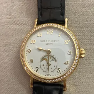 Patek Philippe Moonphase 7121J-001 33mm Yellow gold White