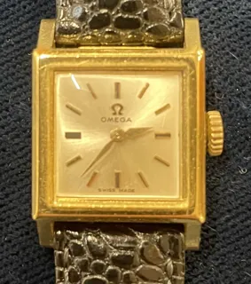 Omega 18k yellow gold