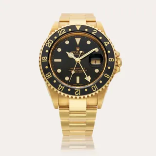 Rolex GMT-Master II 16718T 40mm 18k yellow gold Black