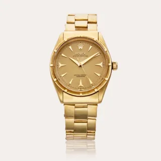 Rolex Oyster Perpetual 34 6569 34mm 18k yellow gold Champagne