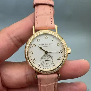 Patek Philippe Moonphase 7121J-001 33mm Yellow gold White