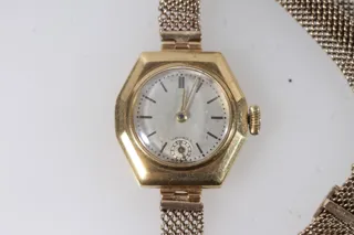 Movado 18k yellow gold Silver