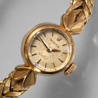 Rolex Orchid 18k yellow gold Champagne