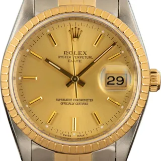 Rolex Oyster Perpetual Date 15223 Stainless steel and 18k yellow gold Champagne