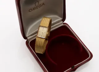 Omega 18k yellow gold Champagne