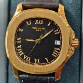 Patek Philippe Aquanaut 5060J 35mm Yellow gold Black