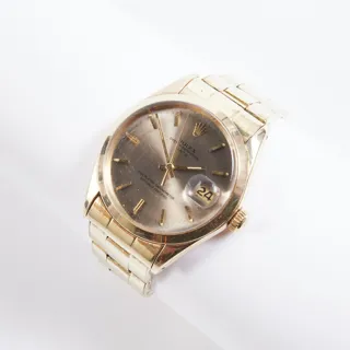 Rolex Oyster Perpetual Date 1500 14k yellow gold Champagne