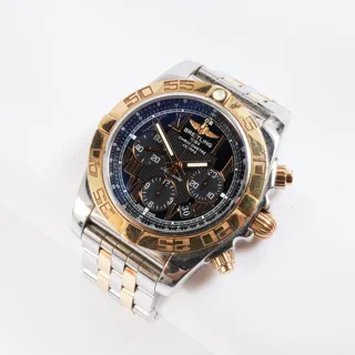 Breitling Chronomat CB0110 Yellow gold and Stainless steel Black