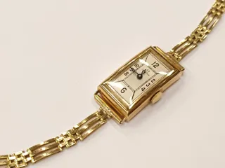 Omega 18k yellow gold