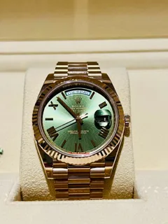 Rolex Day-Date 40 228235 Everose gold Green