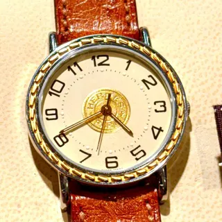 Hermès Sellier SE4.220 24mm Yellow gold and Stainless steel White