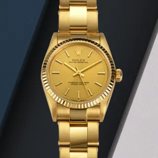 Rolex Oyster Perpetual 31 67518 Yellow gold Champagne