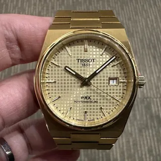 Tissot T-Classic T137.407.33.021.00 40mm Yellow gold and Stainless steel Champagne